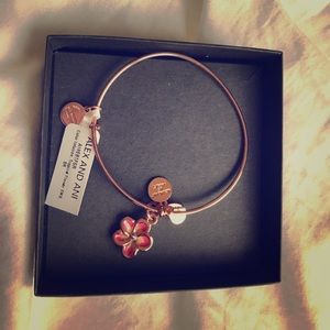 Alex and Ani rose gold bangle with flower charm